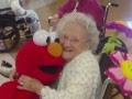 GRANDMA PLAYING WITH TICKLE ME ELMO