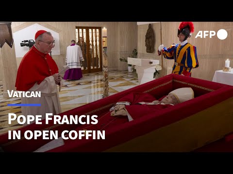 Vatican releases images of Pope Francis in open coffin | AFP