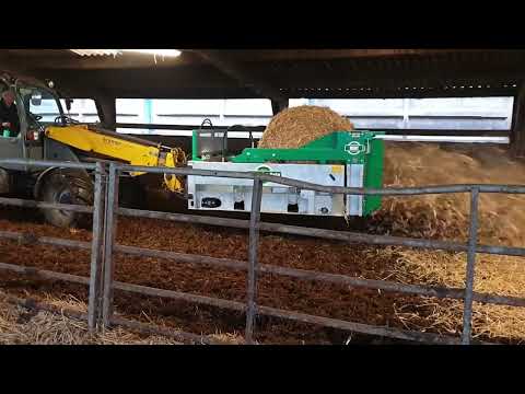 Spread-a-Bale Mini working in livestock pens