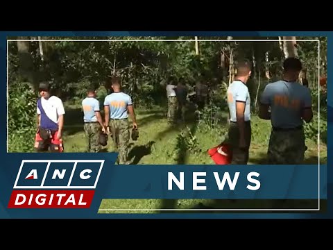 Police help harvest crops near Mayon danger zone