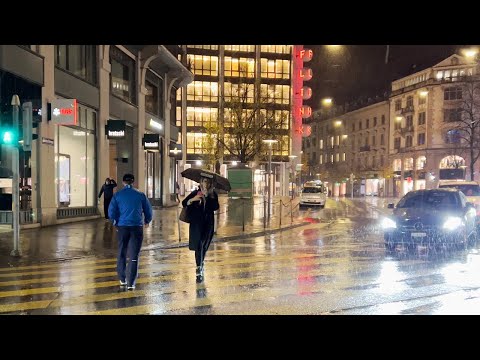 Zurique Bahnhofstrasse caminhada noturna com chuva forte ⛈ passeio a pé em 4K HDR ☔️ novembro de 2023