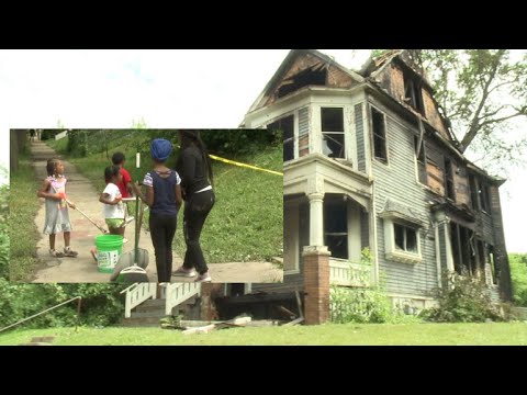 Children clean up community after unrest