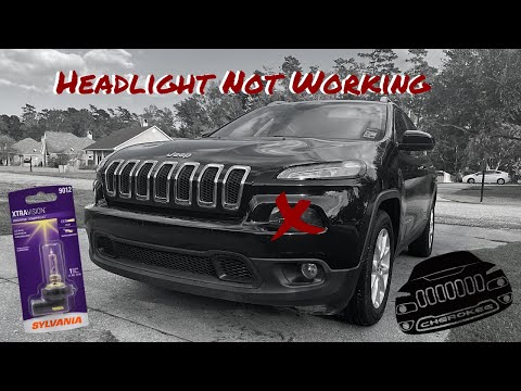 2014 Jeep Cherokee: Headlight Bulb Replacement Low Beam