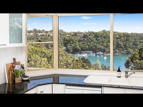 Elevated family haven with panoramic water views. Welcome to 23 Thompson Avenue, Illawong