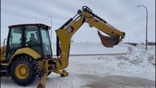 Exploring the 2020 Cat 420 Backhoe Loader