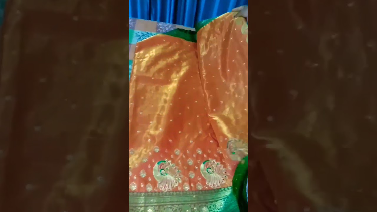 orange and green border. silk saree.👌🥰