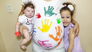 BRINCANDO E APRENDENDO CORES VALENTINA E BEBÊ Reborn BRINCANDO E APRENDENDO CORES VALENTINA E BEBÊ Reborn