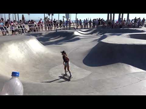 Young Skateboarding Girl Sky brown @ Venice Beach Skatepark