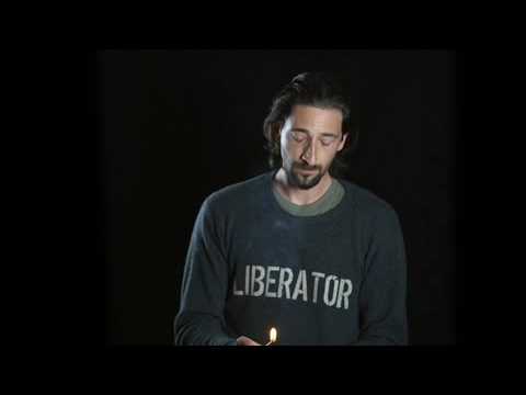 Adrien Brody lighting a candle for Rwanda - http://www.candles4rwanda.org/donate
