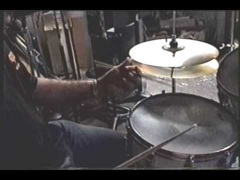 Dick Cully Demonstrates Buddy Rich's Powerful Single Stroke Rolls with a traditional grip.