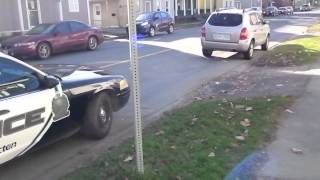 Racists Members of the Fredericton Police Force in front of a Rooming House