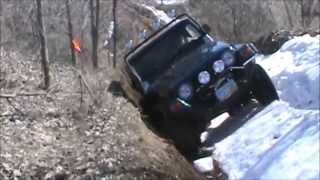 preview picture of video 'Robert's TJ on Wild Country's climbs washout @ Bundy 3-23-2014'
