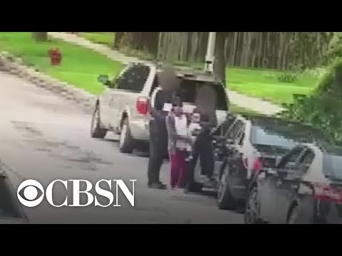 Video shows Chicago mom shot while holding child