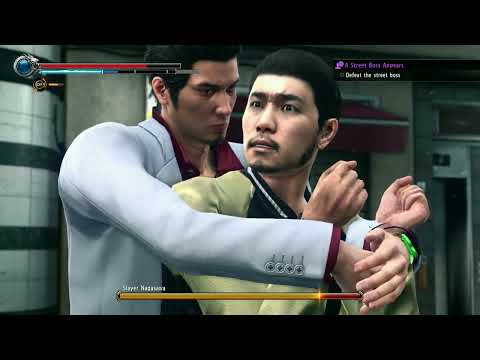 John Yakuza hugs man from behind