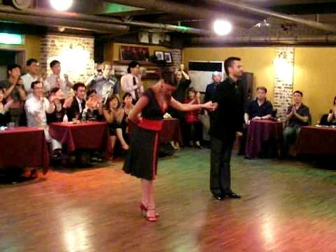  Stella Missé,    Javier Rodriguez,    Carolina Bonaventura,    and  Francisco Forquera  are  dancing  to  the  tango  "  El Ciruja  "  or  "  Recuerdo  "
