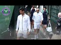 Roger Federer and Novak Djokovic walk onto Centre Court for Wimbledon 2019 Final