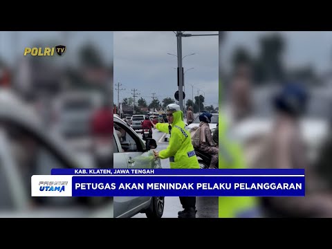 DEDIKASI PERSONEL SATLANTAS POLRES KLATEN DALAM MENGATUR LALU LINTAS DI TENGAH HUJAN