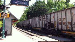 preview picture of video 'CSX passing Kensington Station with empty coal cars'