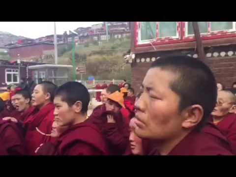 Tibetan Buddhist Monks and Nuns crying as they forced to leave Larung Gar
