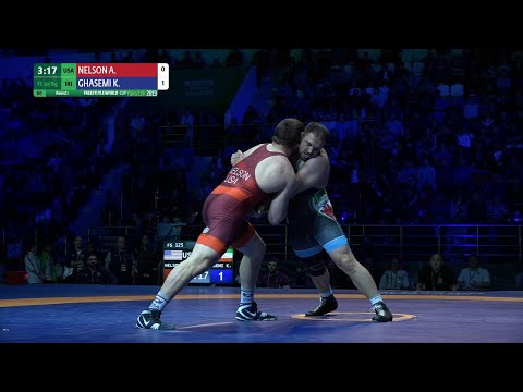 Round 2 FS - 125 kg: A. NELSON (USA) v. K. GHASEMI (IRI)
