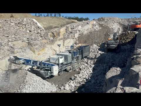volvo 530 excavator feed Jonsson 1208 jaw crusher. quarry action!