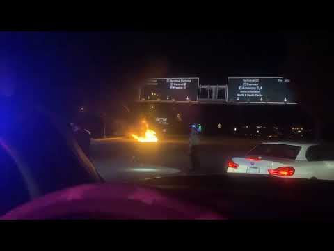 Tesla on fire at RDU International Airport.