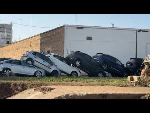 Cars piled up in Valencia after deadly Spain floods | AFP