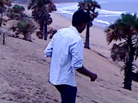 sai playin wid arjun in a beutiful beach.MP4