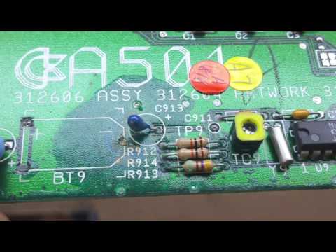 Removing a leaking battery on an Amiga A501 expansion board.