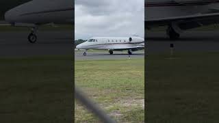 Cessna Citation Excel taxiing on runway Alpha after arrival at Cape May Airport
