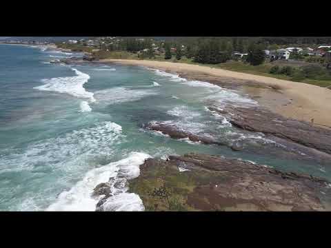 Rakaman hawa Austinmer sareng pasir sakurilingna