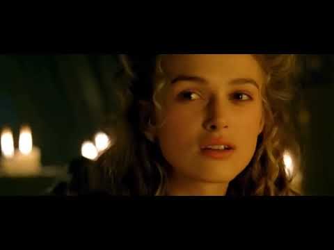 Official trailer moment: the Black Pearl crests a wave under moonlight as drums and low brass surge