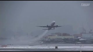 preview picture of video '【Snow-covered Itami】雪景色の大阪国際空港を離着陸する飛行機 -2014.02.08-'