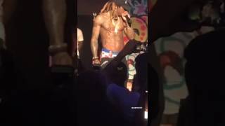Lil Wayne walks off stage in Idaho after fan throws water at him!! he brought his goons out!!