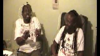 CAVE MAN REGGAE ICON RAPPS WITH BIG STONE AT HIS STUDIO