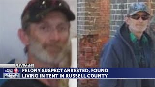 Felony suspect found living in tent in Russell County