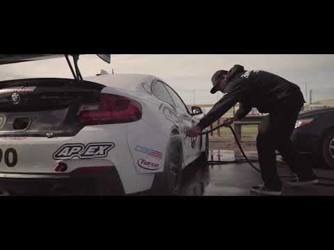 Drive a factory built BMW M235iR race car!