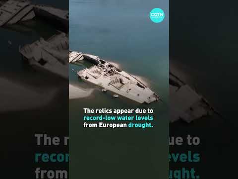 Sunken warships emerge from drought-stricken river