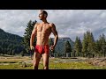 Young Man shows his MUSCULAR BODY