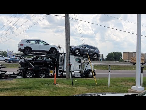 A truck arrived with only 3 cars!