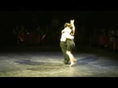  Carlos Espinoza  and  Mamié Sancy  are  dancing  to  a  milonga