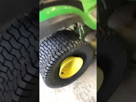 How to quickly seat a new 20-10-8 rear tire on a John Deere D140 riding mower.