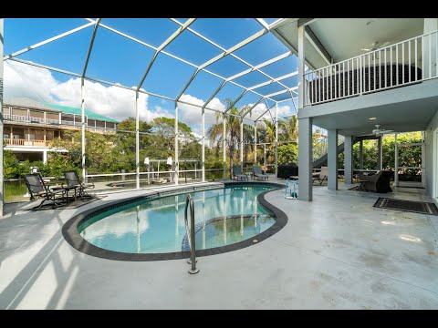 Villa Loriann | Elegant 4-Bedroom Beach & Pool Home with Boat Dock | Sleeps 8