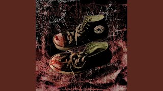 old shoes covered in fresh blood