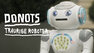 Music video thumbnail preview for DONOTS - Traurige Roboter (Official Video - 80s Remix) by Donots