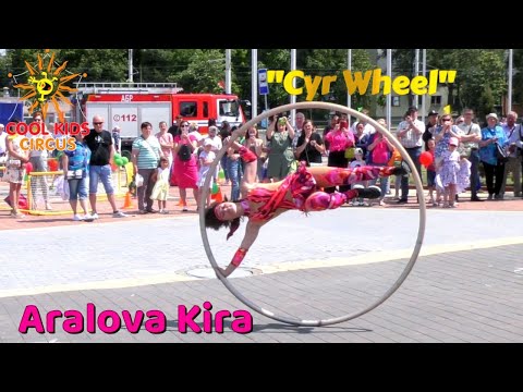 Demonstration performance on the streets of Minsk, young acrobat "Cyr Wheel" - Aralova Kira.