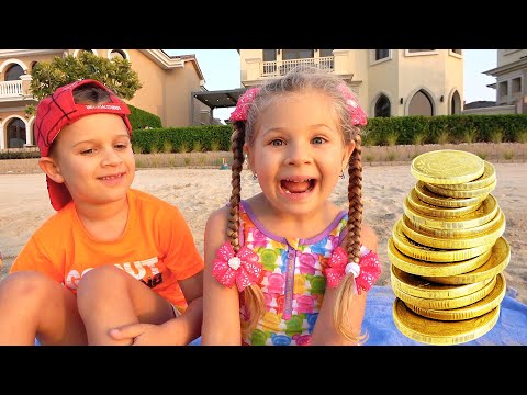 Diana and Roma play on the Beach with Dad