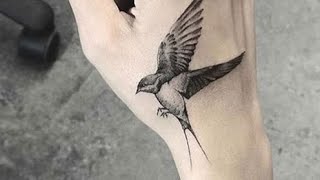 Discover the SECRET Meaning of Tattoo Swallow Designs!