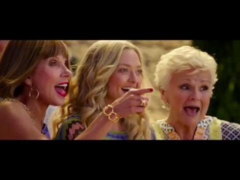 Mamma Mia! Here We Go Again trailer frame with the ensemble cast dancing on the pier