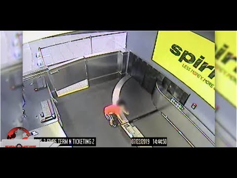 Boy gets caught on airport conveyor belt (ASL - 7.25.19)
